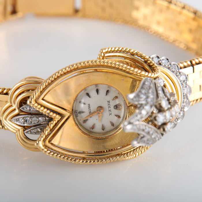 Montre Montre Rolex "dissimulée" or jaune diamants 58 Facettes 110.97
