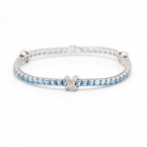 Bracelet Bracelet Or blanc Diamants Topazes 58 Facettes D360499FJ
