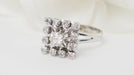 Ring 54 Entourage ring in white gold and diamonds 58 Facettes 32575