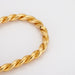 Bracelet Twisted bracelet Yellow gold 58 Facettes 347.40