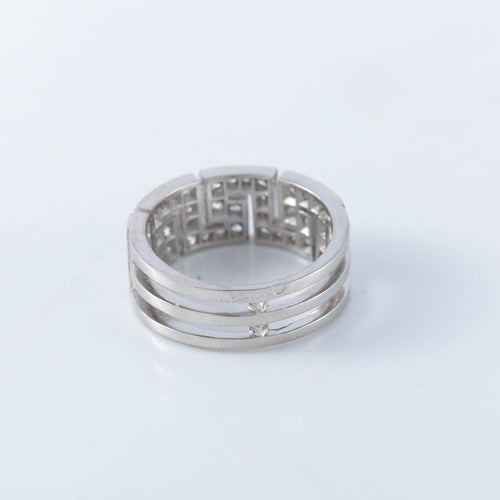 Bague 54 Bague à motifs grecs, diamants et platine 58 Facettes