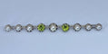 Broche Broche barette en or 18 carats et platine en perles et peridots 58 Facettes AB275