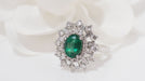Ring 54 Entourage ring in white gold, oval emerald and diamonds 58 Facettes 31617