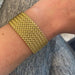 Braided mesh cuff bracelet in 18-carat yellow gold 58 Facettes CAE-BR-MAI-YG