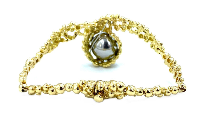 Bracelet GILBERT ALBERT. Bracelet en or jaune et billes interchangeables 58 Facettes