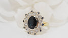 Ring 49 Entourage ring in yellow gold, oval sapphire and diamonds 58 Facettes 31888