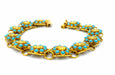 Bracelet Bracelet ethnique en or jaune et turquoises 58 Facettes