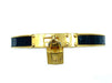 Bracelet Hermès. Bracelet Kelly métal doré et cuir 58 Facettes