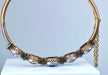Bracelet Bangle bracelet in 18-carat gold, multi-stone: sapphire, topaz, citrine. Napoleon III period. 58 Facettes AB272
