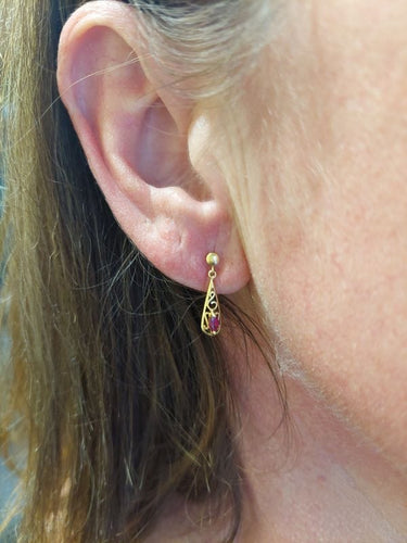 Boucles d'oreilles BOUCLES D'OREILLES PENDANTES RUBIS 58 Facettes 073401