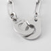 Necklace DINH VAN necklace - R12 handcuffs - white gold 58 Facettes
