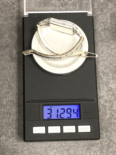 Montre Montre Art Déco platine & or blanc, diamants 2.44 cts 58 Facettes 07/07 - 16