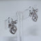 Boucles d'oreilles Boucles d'oreilles Nœud papillon diamants 58 Facettes