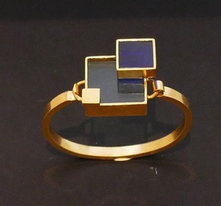 Bracelet Bracelet en métal doré et plexis bleu clair et bleu foncé. 58 Facettes 1035055