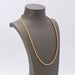 Semi-hollow cord necklace in 18-carat gold 58 Facettes E359865A