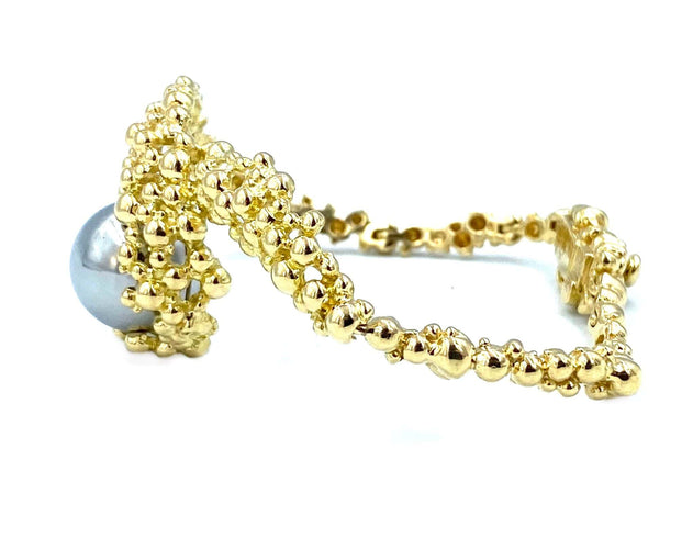 Bracelet GILBERT ALBERT. Bracelet en or jaune et billes interchangeables 58 Facettes