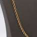 Semi-hollow cord necklace in 18-carat gold 58 Facettes E359865A