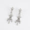 Boucles d'oreilles Boucles pendantes en or gris, diamants 58 Facettes