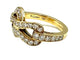 Bague 52 CARTIER. Collection Agrafe, bague en or jaune et diamants 58 Facettes