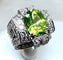 Bague Bague Art Déco Platine diamants et péridot 58 Facettes
