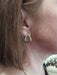 Boucles d'oreilles Créoles modernes triangulaires 58 Facettes 062431