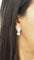 Boucles d'oreilles Pendantes en or blanc, diamants 58 Facettes 32070