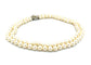 Collier Collier double rangs perles, fermoir or blanc et diamants 58 Facettes