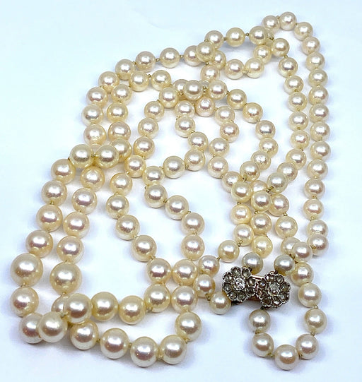 Collier Double collier de perles fermoir diamants. 58 Facettes AB170