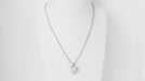 Collier Collier pendentif cœur en Or blanc & Diamants 58 Facettes 31370