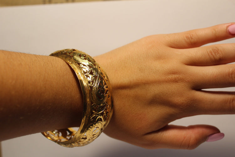 Bracelet Bracelet bombé décor floral ajouré 58 Facettes 11110A