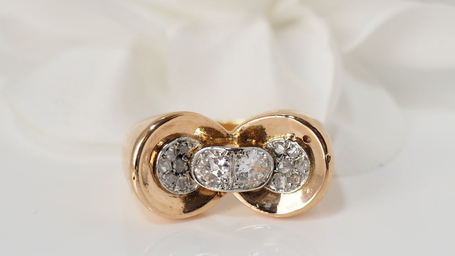 Bague Bague nœud en or rose platine et  diamants 58 Facettes 30247