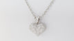 Collier Collier pendentif cœur en Or blanc & Diamants 58 Facettes 31370