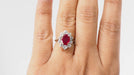 Ring White gold daisy ring with oval ruby ​​and diamonds 58 Facettes 30987