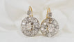 Boucles d'oreilles Dormeuses en or bicolore serties de diamants 58 Facettes 31425