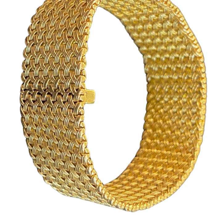 Bracelet Bracelet Manchette mailles tressées en or jaune 18 carats 58 Facettes CAE-BR-MAI-YG