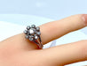 Ring 47 Daisy ring in white gold and diamonds 58 Facettes AB158