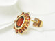 Boucles d'oreilles Boucles d'oreilles marguerite or jaune et grenats 58 Facettes 25806