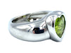 PIAGET ring. 18K white gold and peridot ring 58 Facettes