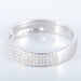 Ring 56 White gold ring with diamond paving 58 Facettes
