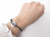 DINH VAN target gm bracelet bracelet in 18k white gold diamonds gray cord 58 Facettes 239410