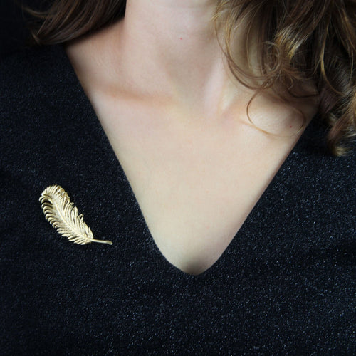 Broche Broche plume d'or jaune 58 Facettes CVBR18A