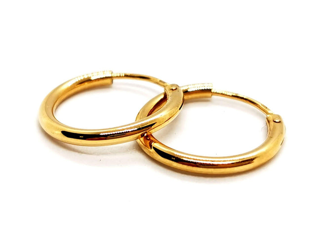 Boucles d'oreilles Boucles d'oreilles Créoles Or jaune 58 Facettes 1167342CN