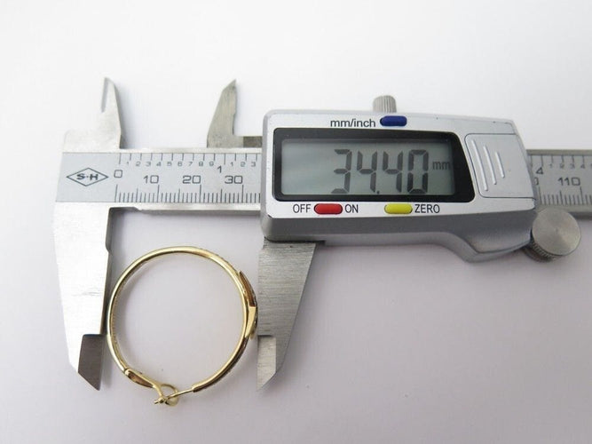 Boucles d'oreilles boucles d'oreilles MAUBOUSSIN creoles etoile divine or & diamants 58 Facettes 246154