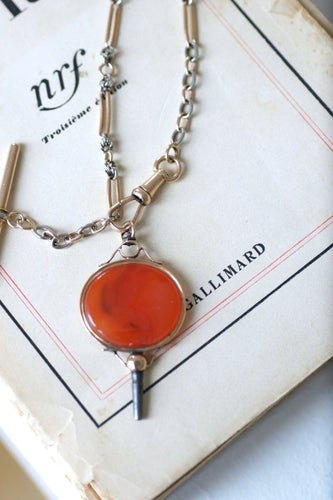 Pendentif Clef de montre ancienne or rose et cornaline 58 Facettes