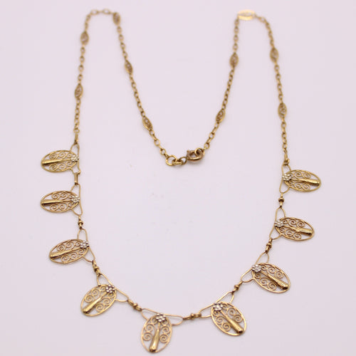 Collier Collier ancien, Draperie, Or jaune 18 carats, Filigrane 58 Facettes