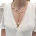 Necklace Pomellato necklace, "Nudo", pink gold, diamonds, white mother-of-pearl, white topaz. 58 Facettes 32762
