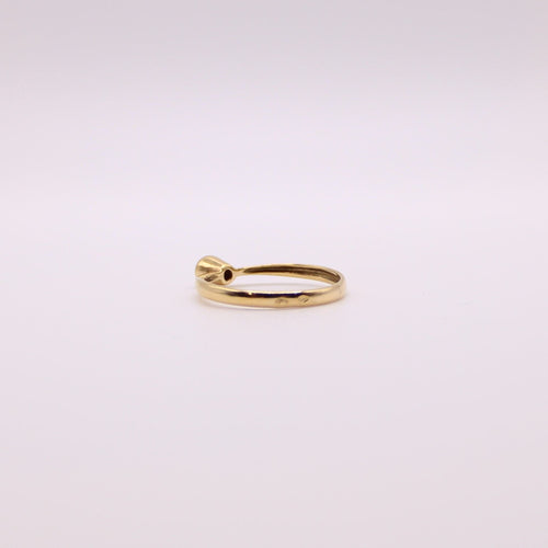 Bague Solitaire en or jaune et diamant serti clos 58 Facettes