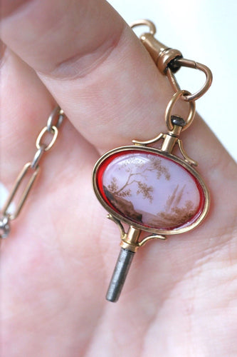 Pendentif Clef de montre paysage miniature sur verre 58 Facettes