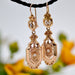 Earrings Rose gold earrings with fine dangling pearls 58 Facettes 21-368