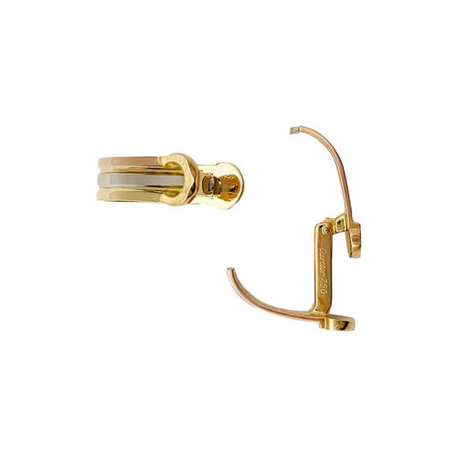 Boutons de manchette Boutons de manchettes Cartier "Mini Ressort CC" trois ors. 58 Facettes 33164